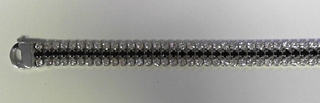 ST---41 SILVER 3 STRAND TENNIS BRACELET