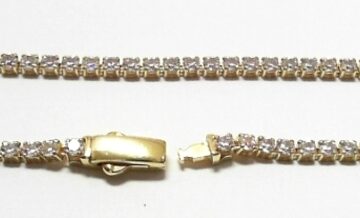 ST---58 SILVER YELLOW PLATED TENNIS BRACELET