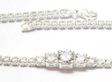 ST---62 SILVER TENNIS BRACELET WITH TAPERED CENTRE
