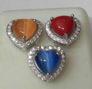 SS--25E SILVER CAT EYE SET IN HEART SHAPE EARRING